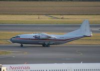 UR-CAG @ VIE - An-12