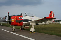 N666GR @ KOSH - North American T-28C - by Mark Pasqualino