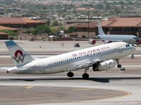 N828AW @ PHX - Airborne from 25R - painted in America West's original colors