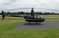 G-OONA @ EGTR - R44 II Helicopter