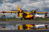 C-GFSK @ CYXX - Conair CL215 - reflection - by Yakfreak - VAP