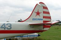 G-BWSV @ EGTR - Yak 52 Blue 43 wears its c/n under the tail