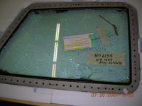 N619UA @ CYUL - Captains windshield after removal - by John J. Boling