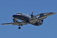N235SW @ KLAS - United Airlines - Express / Embraer EMB-120ER - by Brad Campbell
