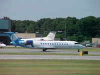 N677BR @ PVD - I miss IndyAir! Independence Air's N677BR prepares to depart Providence on a hot summer afternoon in 2004 - by Geoff Cook