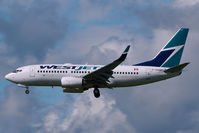 C-GWBF @ CYVR - Westjet Boeing 737-700 - by Yakfreak - VAP