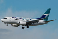 C-GWSB @ CYVR - Westjet Boeing 737-600 - by Yakfreak - VAP