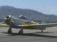 N817TX - 1942 North American AT-6D TEXAN 'Problem Child', P&W R-1340 600 Hp, taxi - by Doug Robertson