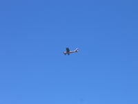 N7687G @ HSE - Landing at Billy Mitchell Airport - by Chris Post