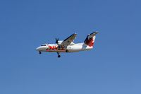 C-GJIG @ CYVR - About to touch down - by Guy Pambrun