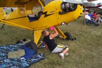 N42785 @ OSH - Cleaning it up - paying for his ride! - by Andrew Cornell