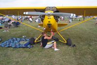 N42785 @ OSH - Cleaning it up - paying for his ride! - by Andrew Cornell