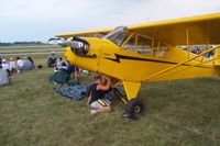 N42785 @ OSH - Cleaning it up - paying for his ride! - by Andrew Cornell