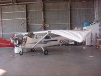 N3521A @ KSSF - 3521A Storm Damage - by Chris Hill