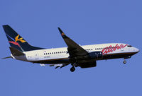 N738AL @ SNA - Aloha B737-73A Climbing the blue sky. - by Mike Khansa