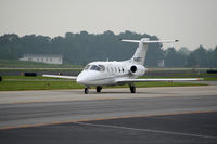 N467LX @ PDK - Taxing to Signature Flight Services - by Michael Martin