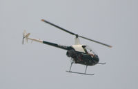 N971GJ @ PDK - Over flying PDK - by Michael Martin