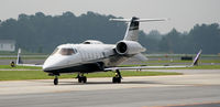 XA-KCM @ PDK - Taxing to Signature Flight Services - by Michael Martin