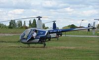 G-OLAU @ EGMC - Robinson R22 Beta - by Terry Fletcher