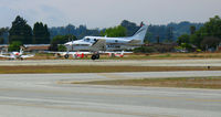 N333BM @ WVI - EFS Charter Service 1997 Raytheon Aircraft Company C90A touching down @ Watsonville, CA airshow - by Steve Nation