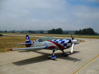 N771TA @ WVI - Tutima Academy of Aviation Safety 2006 Extra Flugzeugbau Gmbh EA 300/L ready to perform @ Watsonville, CA airshow - by Steve Nation