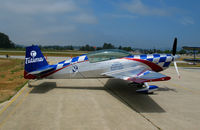 N771TA @ WVI - Tutima Academy of Aviation Safety 2006 Extra Flugzeugbau Gmbh EA 300/L ready to perform @ Watsonville, CA airshow - by Steve Nation