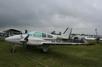 N5793K @ KOSH - Beech B55 - by Mark Pasqualino