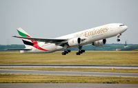 A6-EMF @ LOWW - Emirates starts in Vienna to Dubai