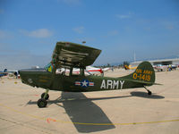 N5264G @ WVI - 1956 Cessna 305A as U.S. Army 0-1419 Con Tiki @ Watsonville, CA airshow - by Steve Nation