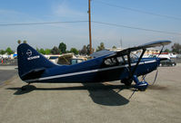 N6486M @ WVI - Midnight blue 1949 Stinson 108-3  as NC6486M @ Watsonville, CA airshow - by Steve Nation