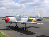 G-CDFE @ EGBT - Colourful Yak-52 based at Turweston