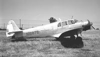 N16876 - Metalized fuselage. At Newman, CA, in 1966. - by Bill Larkins