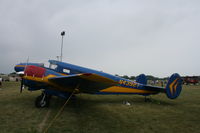 N43927 @ KOSH - Beech D18S - by Mark Pasqualino