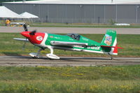 N821MG @ KOSH - EA 300/S - by Mark Pasqualino