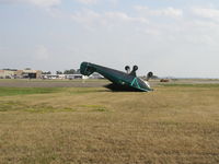 N8927C @ KFCM - 61 Knot (70 MPH) gusts from an early morning storm blew over this Tri-Pacer. - by Mitch Sando