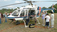 N34VA - Virginia State Police-2000 Bell 407-  showing off for those attending the Laurel Grove Vol. Fire & Rescue 25th Anniversary Celebration in Pittsylvania County Va. near the Halifax County border. - by Richard T Davis