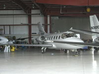 N129BT @ KFCM - Beechjet inside Executive Aviation's Hangar at Flying Cloud Airport in Eden Prairie, MN. - by Mitch Sando