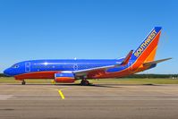 N406WN @ KISP - Shining bright on a gorgeous summer day. - by lijk604