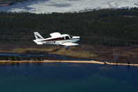 N9143W @ CMX - Piper passing close for skypixs photographers - by Rick Anderson