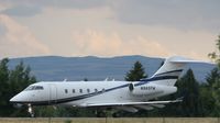 N985FM @ IDA - Takeoff roll - Background in HS Soccer Match - by Patrick Laney