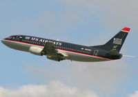 N533AU @ PHL - Departing rw 27L.