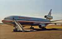N162AA @ EWR - Beautifully shiny DC-10-10 (delivered in 1974 to National) shows off her lines in this June 1990 view at EWR. - by Daniel L. Berek