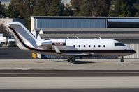 N460F @ SMO - 1989 Canadair CL-600-2B16 taxiing to RWY 21 for departure. - by Dean Heald