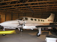 N3747C @ KLVN - Cessna 414 parked inside it's hangar. - by Mitch Sando