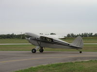 N8260C @ KLVN - Taxiing to Runway 30. - by Mitch Sando