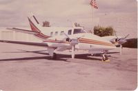 N99BE @ VNY - 2nd Image - In Front of Terminal at VNY in 1980.