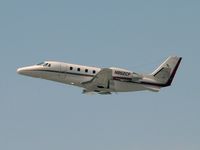 N862CF @ PHX - Departure from runway 07L - by John Meneely