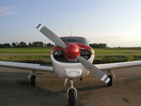 N7707P @ KLVN - Parked on the ramp at Airlake. - by Mitch Sando