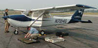 N7214G @ DAN - 1969 Cessna 172K in Danville Va. Plane being used to film the AMA Superbike Championships  at nearby Virginia International Raceway for Speedvision. - by Richard T Davis