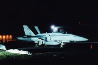 162834 @ CID - F/A-18A at the Rockwell-Collins ramp. ASA 1600 film at midnight after I got off work.  I had to hold the camera REAL still with an open shutter for about 4 seconds.